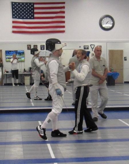 FAB members practicing foil and saber together at Fencing Academy of Boston